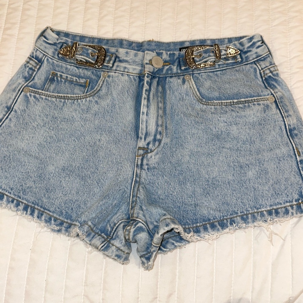 High rise light denim shorts size 25.